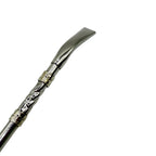 Close-up of the pico de loro mouthpiece and the upper crafted ring detail on the Double Ring Alpaca Bombillón.