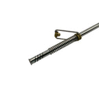 Close-up horizontal view of the Limay bombilla's stainless steel filter, showing the stirrup mechanism compressing the spring to reveal cleaning slits for easy maintenance.