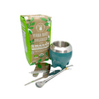 Complete Organic Master Mate Kit items spread out: 500g bag of Amanda Organic Yerba Mate, a modern lagoon-teal stainless steel Paton Mate cup, a premium gold-ring bombilla, a custom yerba separator tool, and a cleaning brush.