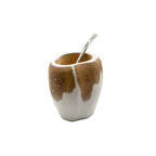 Handcrafted wooden mate set featuring a white and natural wood cup with silver studs and an included bombilla.