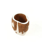 A slightly angled, top-down view of a handcrafted wood and white mate gourd against a white background. The angle reveals the hollow interior for yerba mate and showcases the natural rim, along with the rustic animal hide pattern wrapping around the exterior.