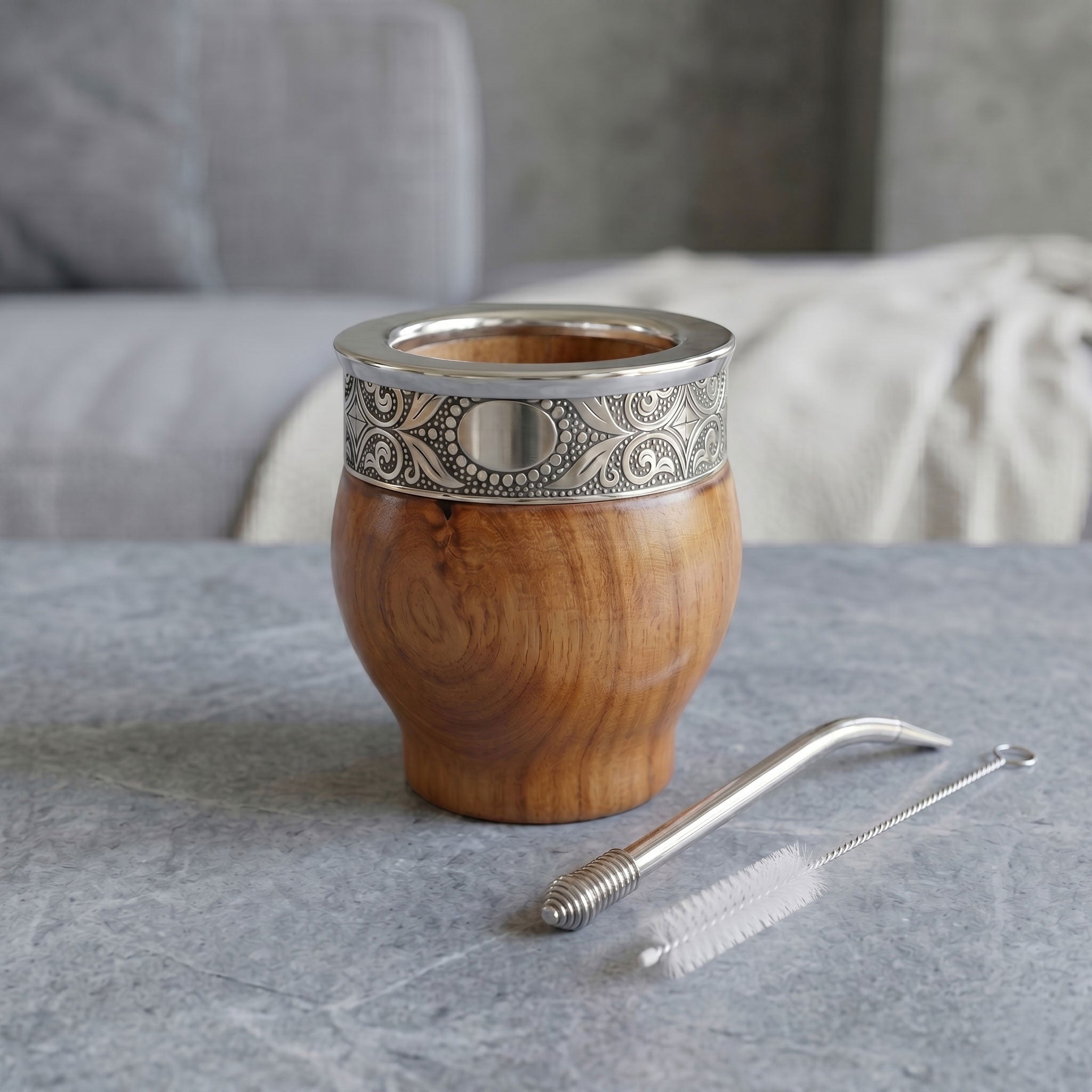 Triunfo Mate Gourd Set in solid algarrobo wood, featuring an engraved stainless steel rim, classic nickel bombilla, and cleaning brush