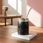 Premium Firmeza Imperial Criollo mate gourd in black hand-tooled leather with a chiseled Alpaca rim and silver bombilla straw.