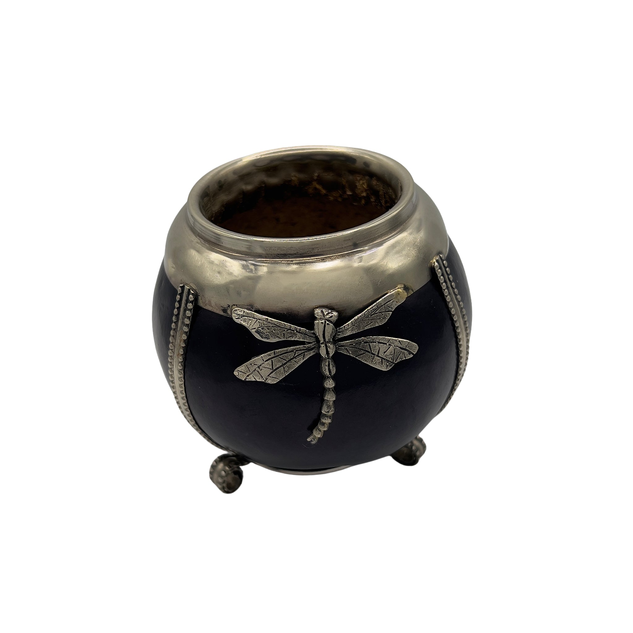 Perspective view of the Baguala mate gourd highlighting the intricate hand-carved dragonfly motif on the premium alpaca silver rim.