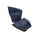 Two dark navy blue quilted puffer pouches against a plain white background, with the larger pouch standing upright and the smaller one lying flat in front of it.