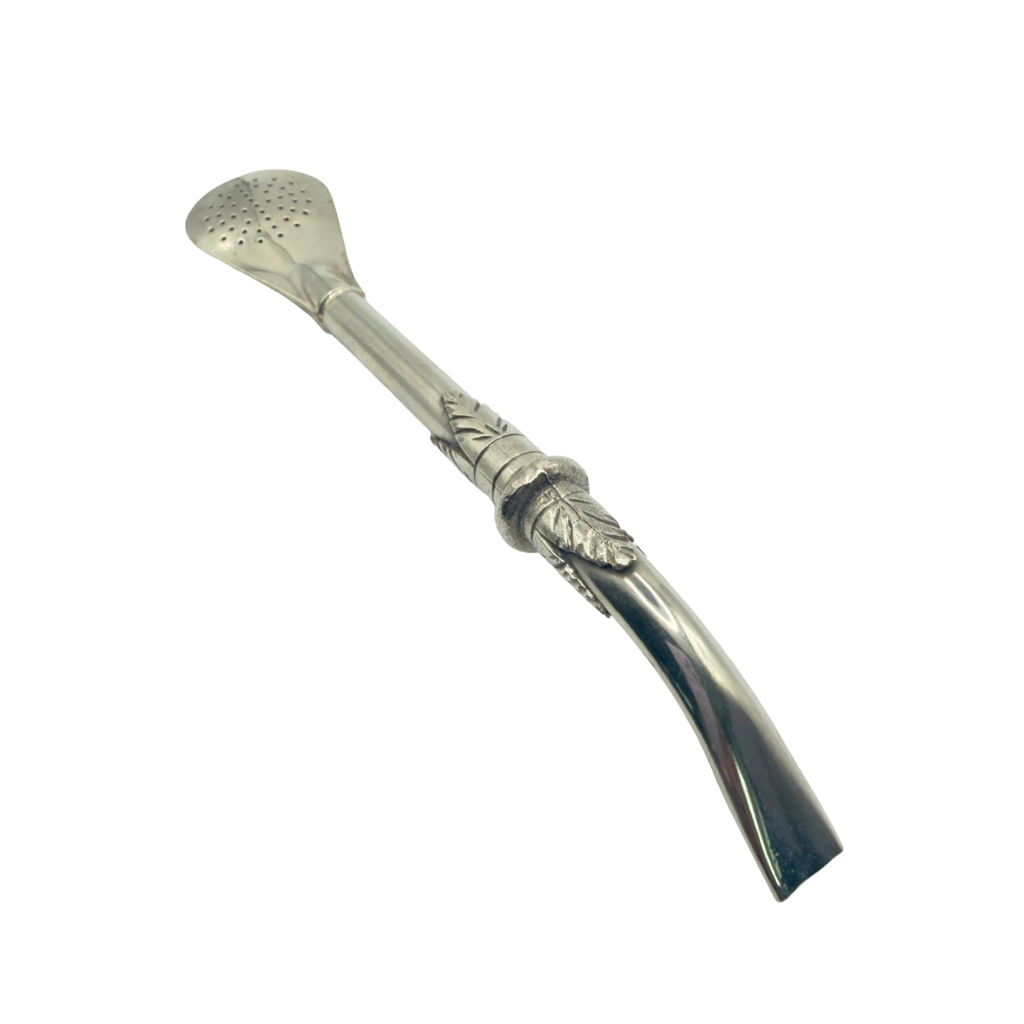 Profile view of the curved pico de loro mouthpiece with intricate leaf detailing on the premium Alpaca Bombillón.
