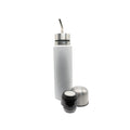 An elegant, matte white insulated flask meticulously designed for yerba mate drinkers, featuring a unique integrated bombilla spout. Disassembled views of the silver cap and black pourer highlight its sleek functionality