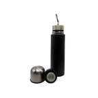 A sleek, matte black insulated mate flask featuring an integrated stainless steel bombilla spout. The detachable silver outer cap and the black push-button pouring stopper rest at the base, showcasing its versatile design.