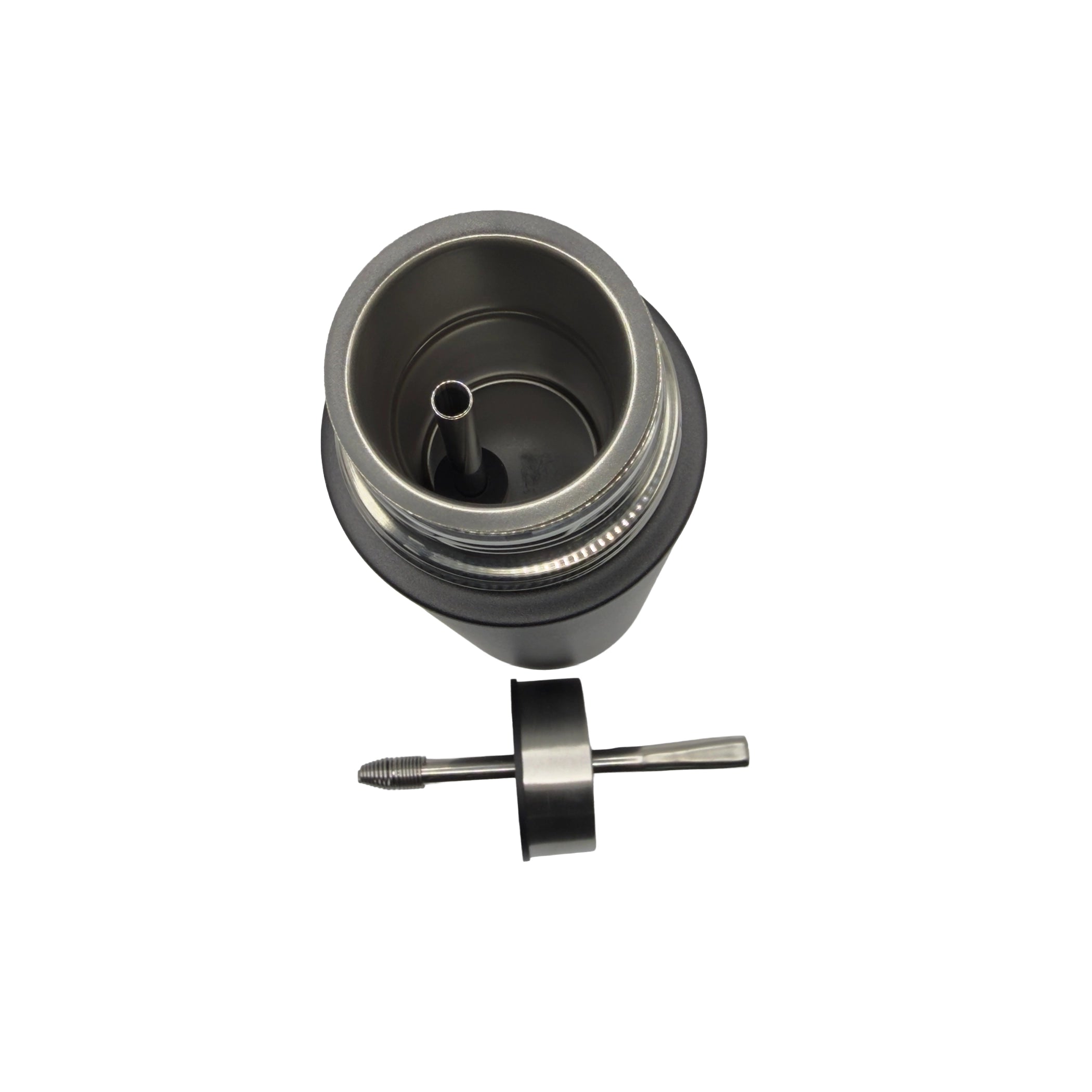 A top-down view into the premium double-walled stainless steel interior of the matte black mate thermos. The internal metal straw tube is visible inside the clean chamber, with the specialized sipping lid resting beside the flask.