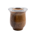Side view of a turned, lacquered algarrobo wood mate gourd with a polished stainless steel rim against a white background.