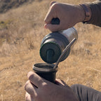 Sur 360-degree replacement stopper for Stanley Classic thermos flasks pouring water into a mate cup.