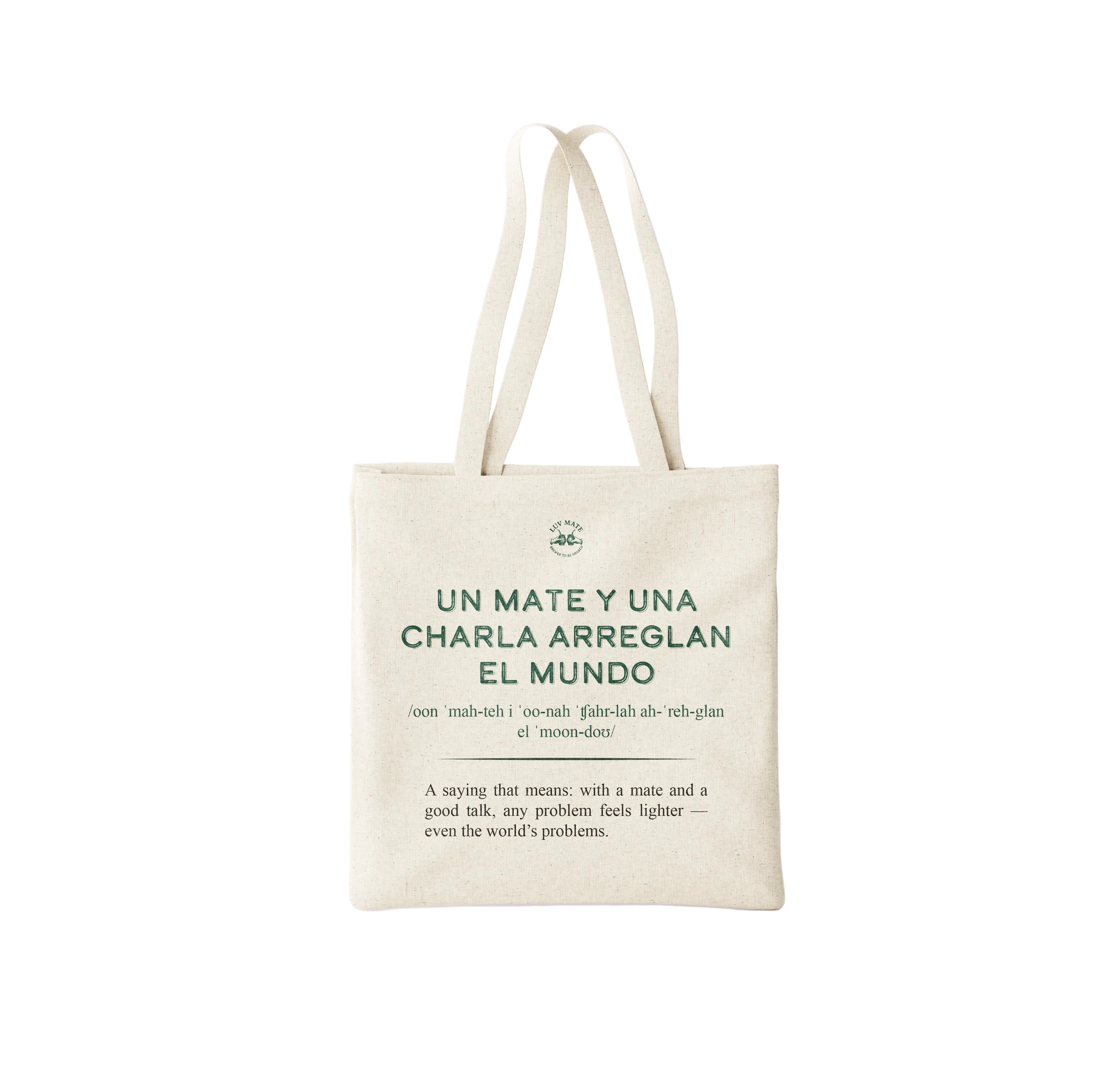 Eco-friendly tote bag with the inspiring Spanish quote 'un mate y una charla arreglan el mundo' in a minimalist black font