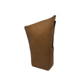 Side profile view. Handcrafted leather yerbera (yerba mate storage bag) in a light tan Adobe Brown color stands vertically against a white background. It shows the secure top zipper and highlights the integrated side leather loop with a metal bombilla inserted for display purposes only (bombilla sold separately).