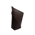 A closed, handcrafted leather yerba mate bag in rich brown, standing upright. It highlights the integrated side leather loop designed as a bombilla holder, demonstrated here with a metal bombilla inserted for display purposes only (bombilla sold separately).