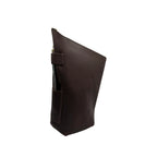 A closed, handcrafted leather yerba mate bag in rich brown, standing upright. It highlights the integrated side leather loop designed as a bombilla holder, demonstrated here with a metal bombilla inserted for display purposes only (bombilla sold separately).