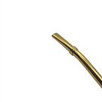 Close-up detail of the ergonomic mouthpiece on the gold Puna bombilla.