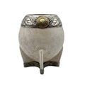 Handcrafted Sol de Mayo Torpedo Mate cup made of premium natural vegetable-tanned leather, featuring a hand-chiseled alpaca silver rim and a bronze Sun of May emblem.
