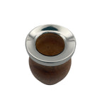 Top-down view of an empty algarrobo wood mate gourd, highlighting the inner cavity and round stainless steel rim.